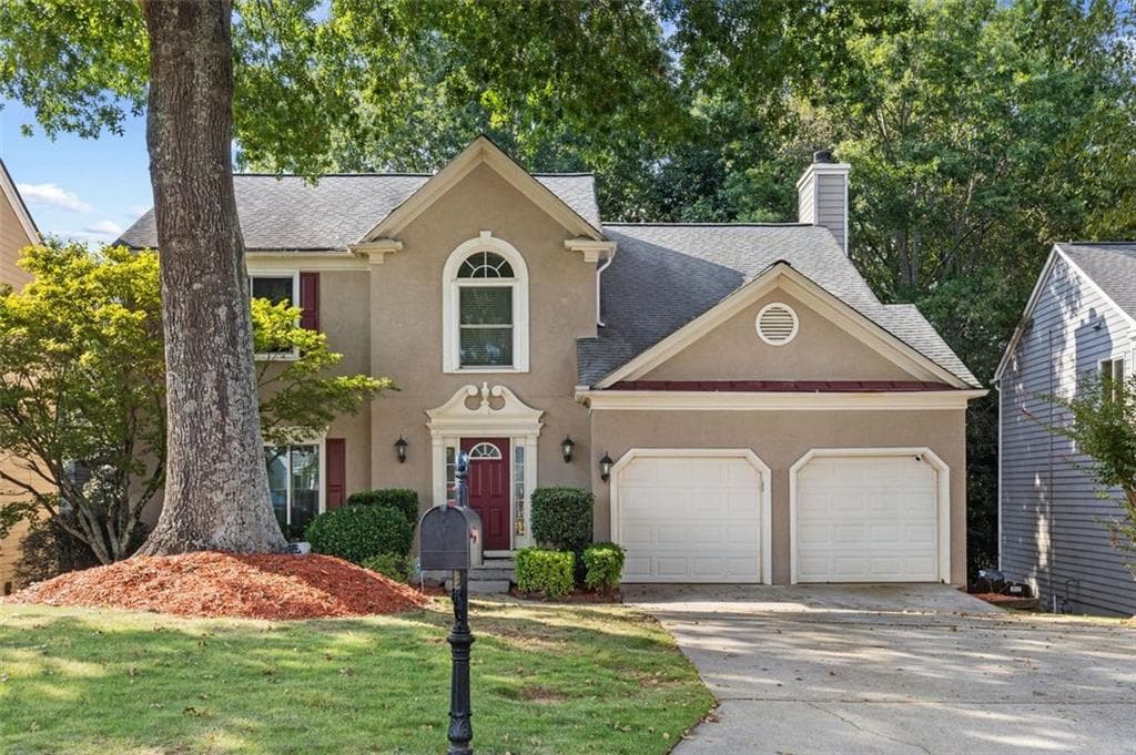 5 bedroom, 4 bathroom, 3,247 sq ft single family residence for sale at 2555 Kingsbrooke Lane, Duluth, GA 30097 — photo 2