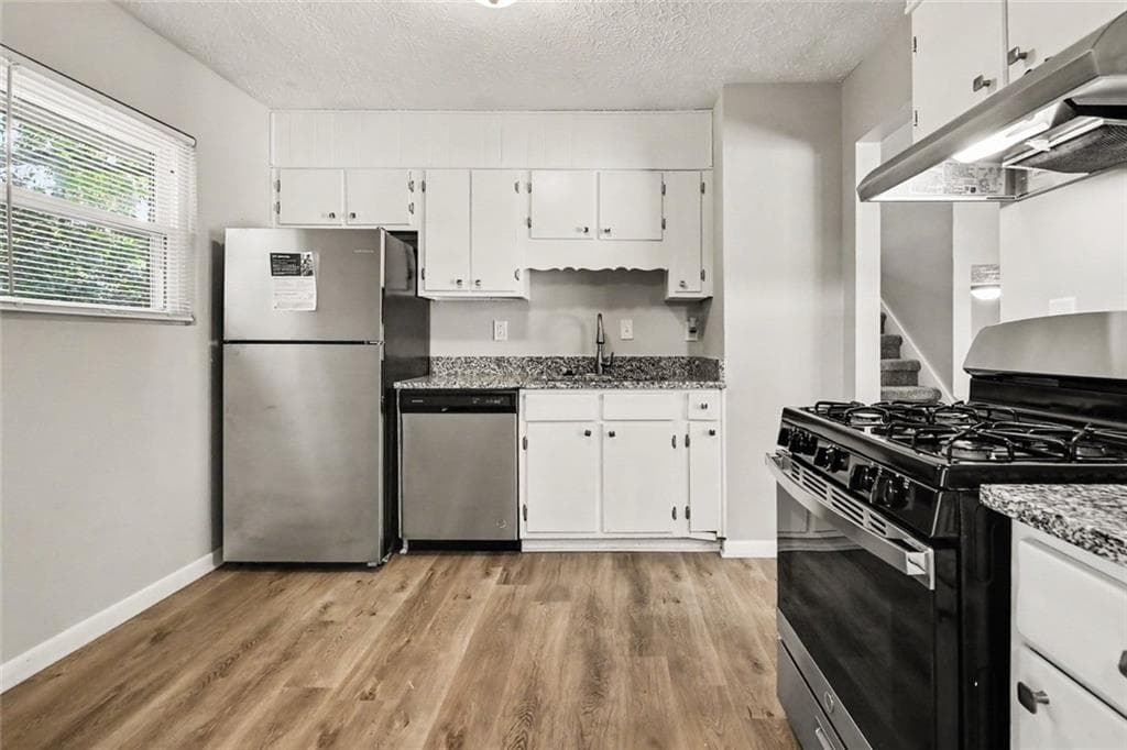 3 bedroom, 2 bathroom, 1,756 sq ft single family residence for sale at 940 Michael Drive, Atlanta, GA 30349 — photo 6