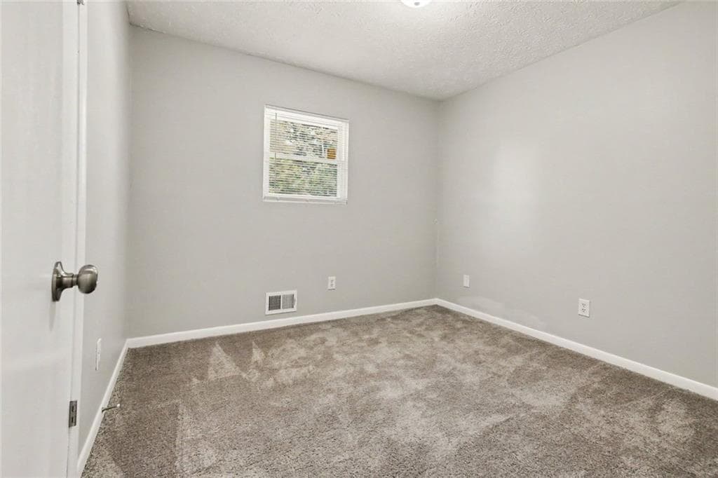 3 bedroom, 2 bathroom, 1,756 sq ft single family residence for sale at 940 Michael Drive, Atlanta, GA 30349 — photo 10