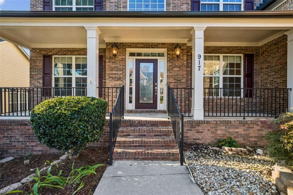6 bedroom, 5 bathroom, 4,862 sq ft single family residence for sale at 917 Wallace Falls Drive, Braselton, GA 30517 — photo 4
