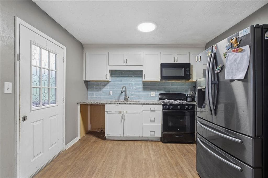 5 bedroom, 2 bathroom, 2,250 sq ft single family residence for sale at 541 Carithers Road, Lawrenceville, GA 30046 — photo 9