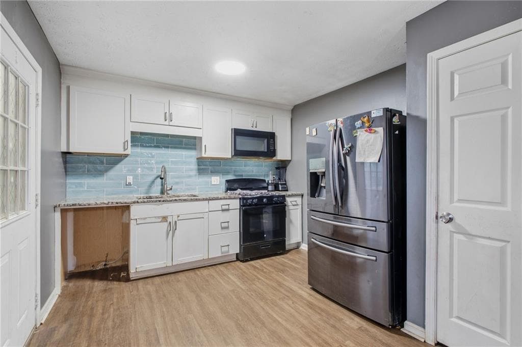 5 bedroom, 2 bathroom, 2,250 sq ft single family residence for sale at 541 Carithers Road, Lawrenceville, GA 30046 — photo 10