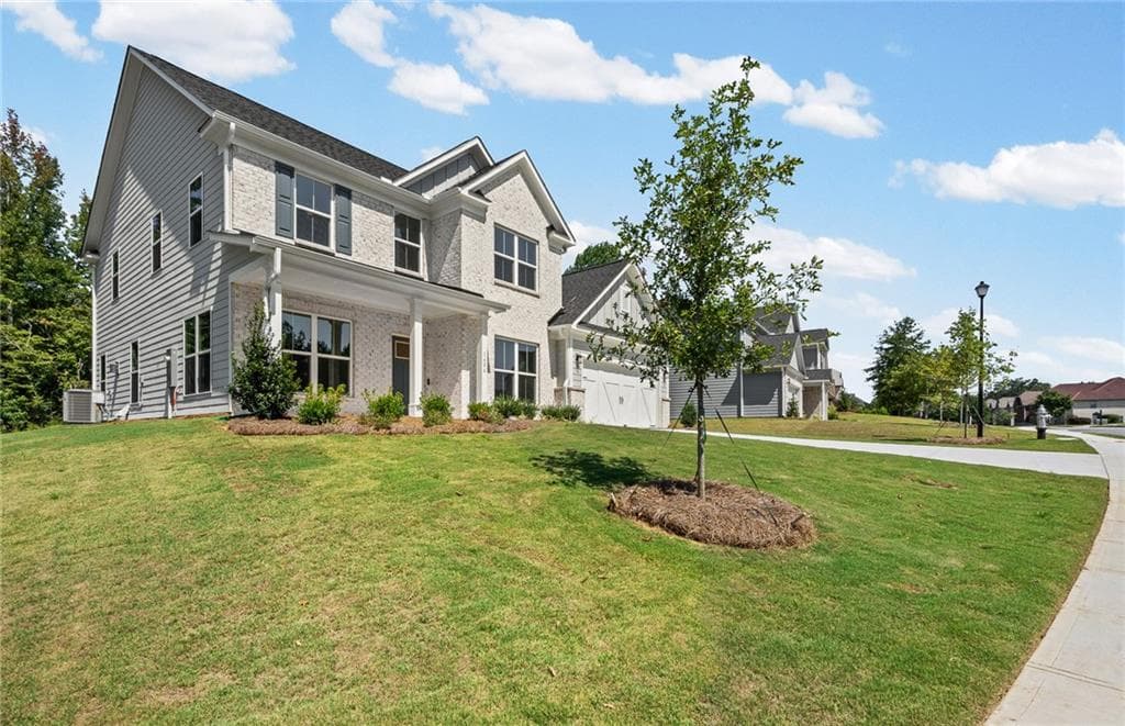 5 bedroom, 5 bathroom, 3,309 sq ft single family residence for sale at 1606 Waterchase Drive, Dacula, GA 30019 — photo 2