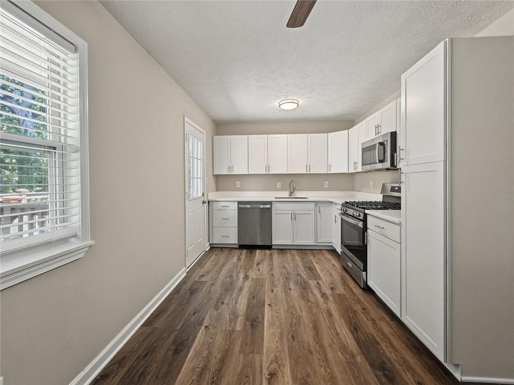 3 bedroom, 2 bathroom, 1,075 sq ft single family residence for sale at 1898 Burfordi Drive, Marietta, GA 30008 — photo 6