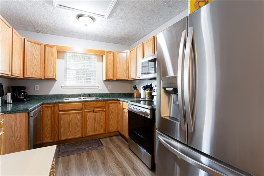 3 bedroom, 2 bathroom, 1,471 sq ft townhouse for sale at 6551 Wellington Chase Court, Lithonia, GA 30058 — photo 6