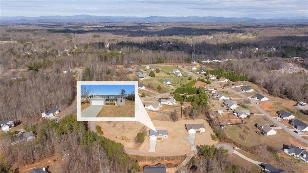 3 bedroom, 2 bathroom, 1,618 sq ft single family residence for sale at 613 Cypress Drive, Mount Airy, GA 30563 — photo 2