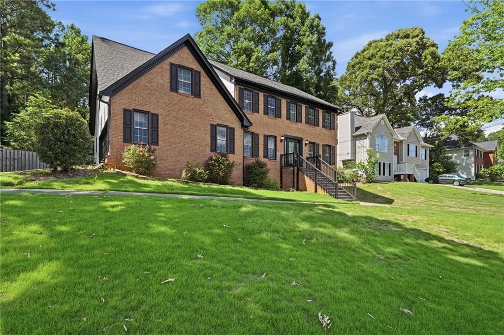 5 bedroom, 3 bathroom, 3,117 sq ft single family residence for sale at 4040 Camaron Way, Snellville, GA 30039 — photo 2