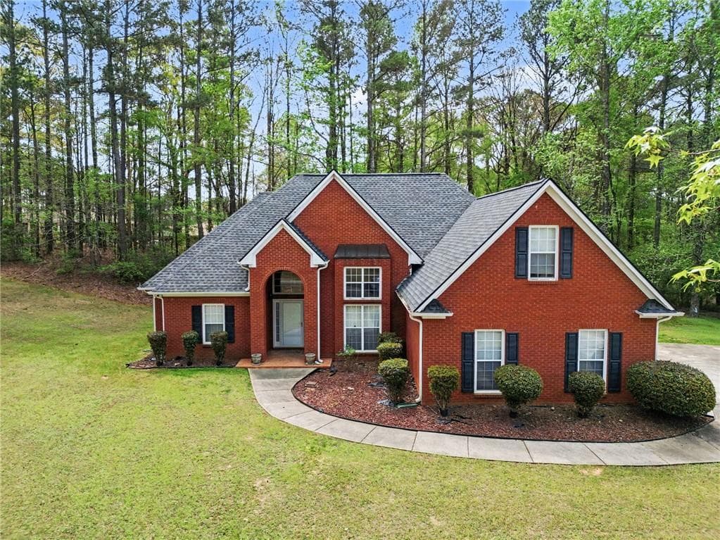 4 bedroom, 2 bathroom, 2,266 sq ft single family residence for sale at 1041 Olive Drive, Hampton, GA 30228