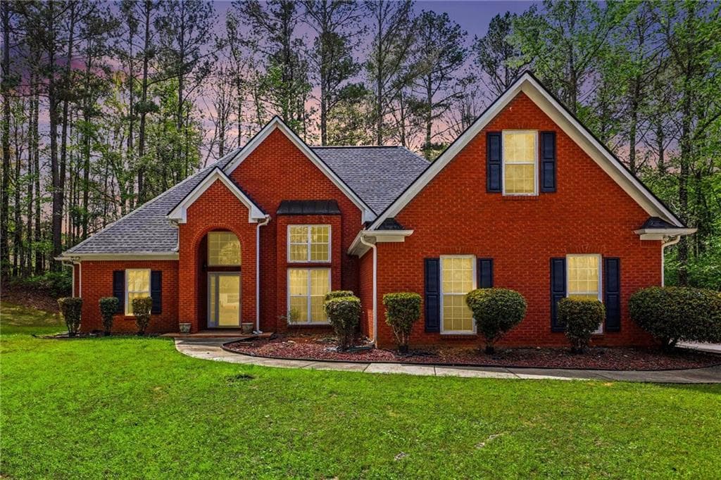 4 bedroom, 2 bathroom, 2,266 sq ft single family residence for sale at 1041 Olive Drive, Hampton, GA 30228 — photo 2