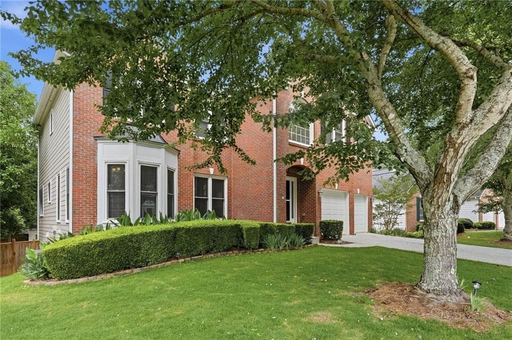 6 bedroom, 4 bathroom, 3,117 sq ft single family residence for sale at 160 Treadstone Overlook, Suwanee, GA 30024 — photo 2