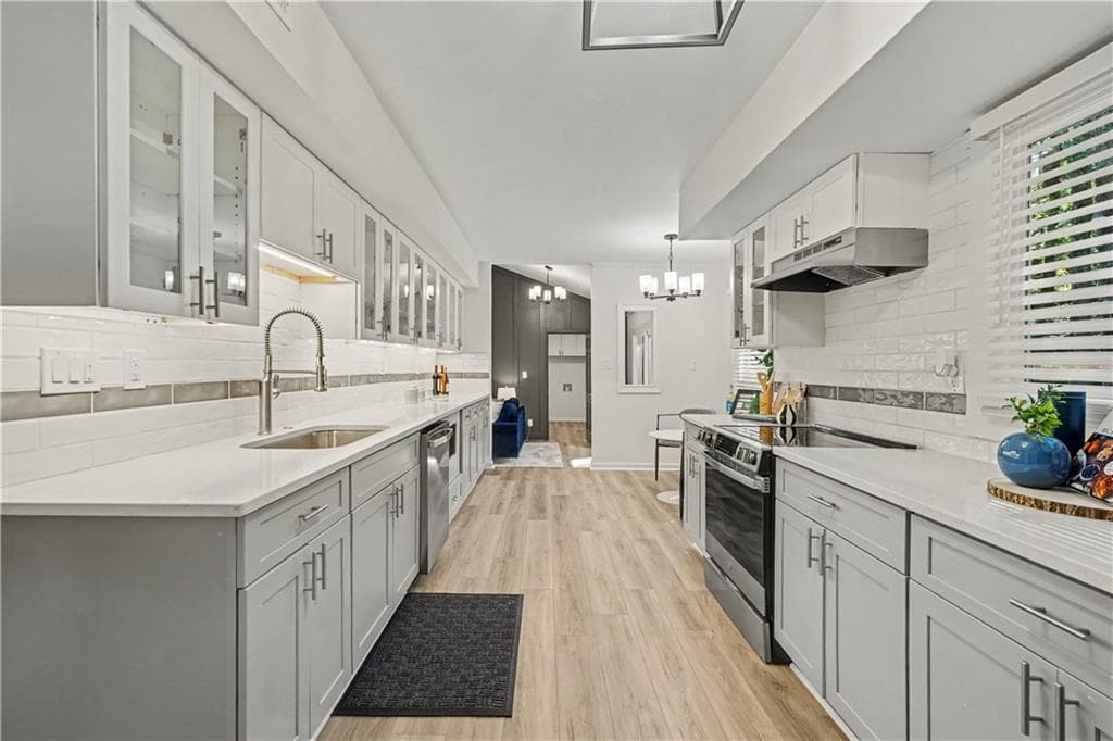 4 bedroom, 3 bathroom, 2,164 sq ft single family residence for sale at 5230 Essex Farms Court, Stone Mountain, GA 30088 — photo 7