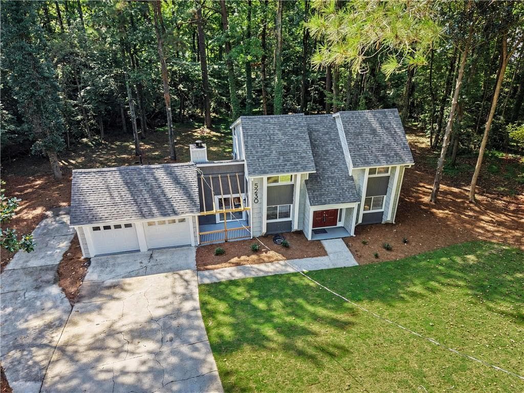 4 bedroom, 3 bathroom, 2,164 sq ft single family residence for sale at 5230 Essex Farms Court, Stone Mountain, GA 30088 — photo 2
