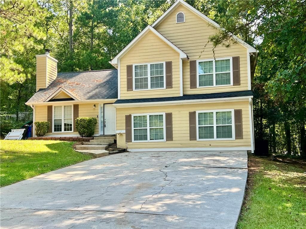 3 bedroom, 2 bathroom, 2,299 sq ft single family residence for sale at 4010 Marshwood Trace, Atlanta, GA 30349 — photo 3