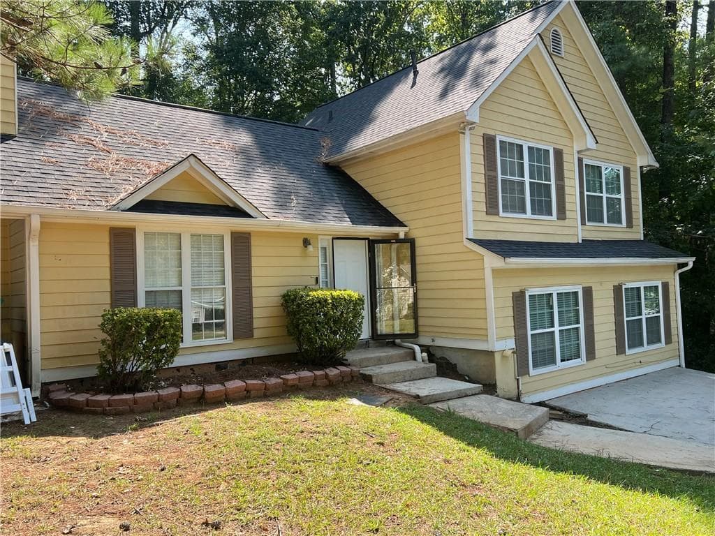 3 bedroom, 2 bathroom, 2,299 sq ft single family residence for sale at 4010 Marshwood Trace, Atlanta, GA 30349 — photo 5
