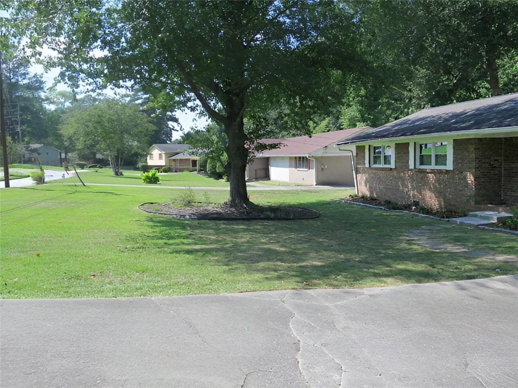 3 bedroom, 2 bathroom, 1,460 sq ft single family residence for sale at 2455 Thornton Drive, Atlanta, GA 30349 — photo 5