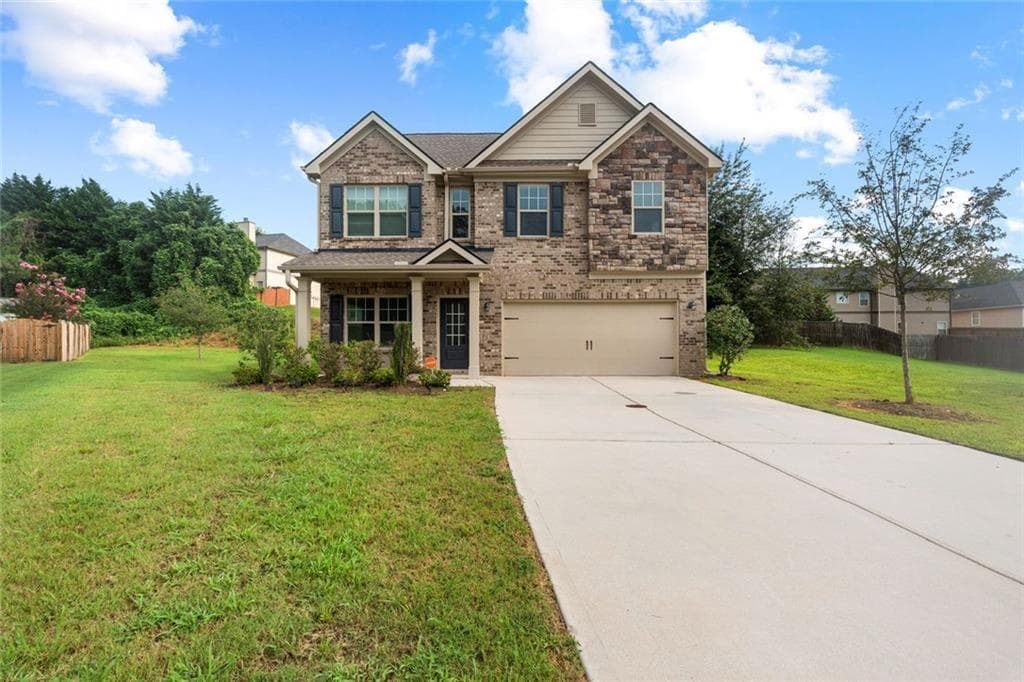 4 bedroom, 3 bathroom, 1,955 sq ft single family residence for sale at 7974 Granmore Court, Lithia Springs, GA 30122