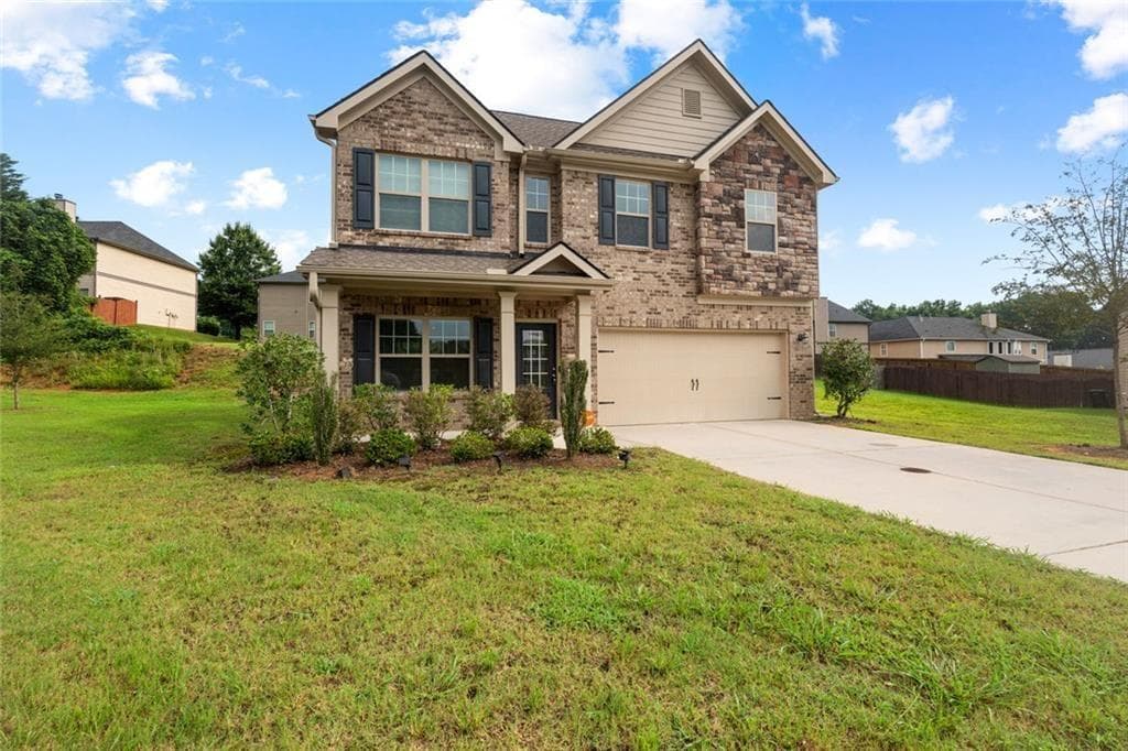 4 bedroom, 3 bathroom, 1,955 sq ft single family residence for sale at 7974 Granmore Court, Lithia Springs, GA 30122 — photo 3
