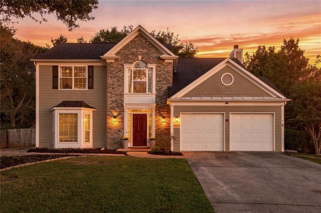 4 bedroom, 3 bathroom, 2,160 sq ft single family residence for sale at 3435 Lakeheath Drive, Cumming, GA 30041 — photo 2