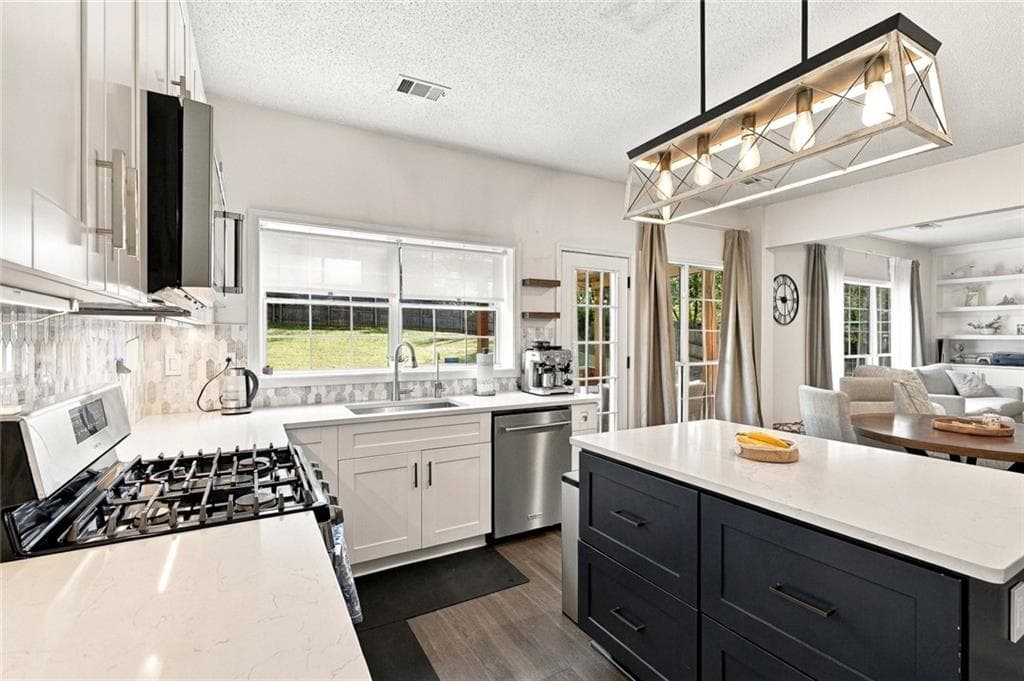 4 bedroom, 3 bathroom, 2,160 sq ft single family residence for sale at 3435 Lakeheath Drive, Cumming, GA 30041 — photo 10