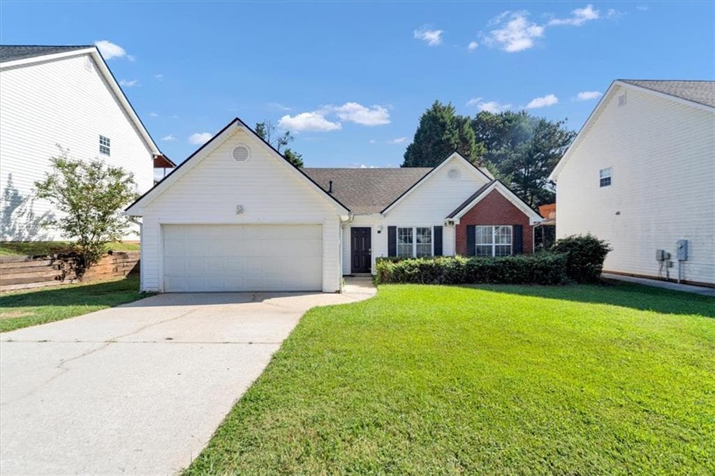 3 bedroom, 3 bathroom, 1,587 sq ft single family residence for sale at 1129 Olde Hinge Way, Snellville, GA 30078