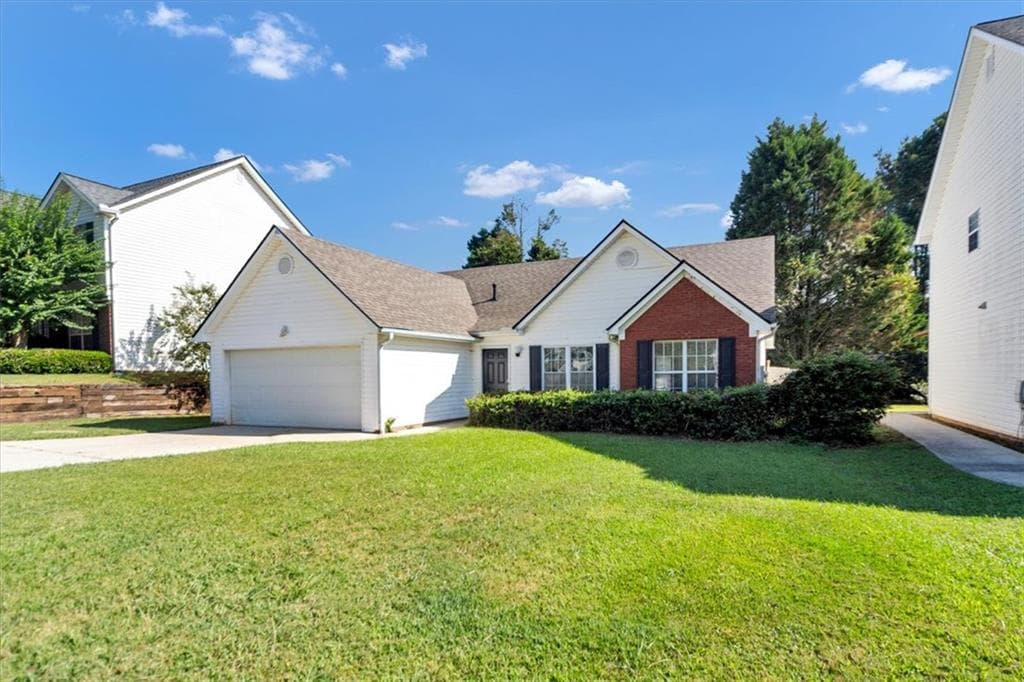3 bedroom, 3 bathroom, 1,587 sq ft single family residence for sale at 1129 Olde Hinge Way, Snellville, GA 30078 — photo 2