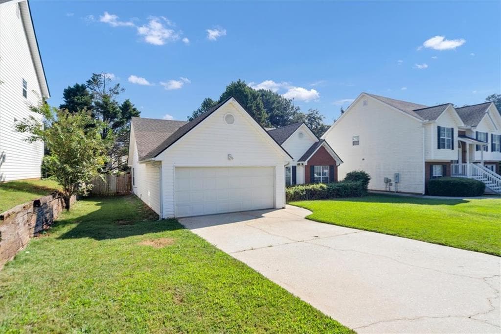 3 bedroom, 3 bathroom, 1,587 sq ft single family residence for sale at 1129 Olde Hinge Way, Snellville, GA 30078 — photo 3