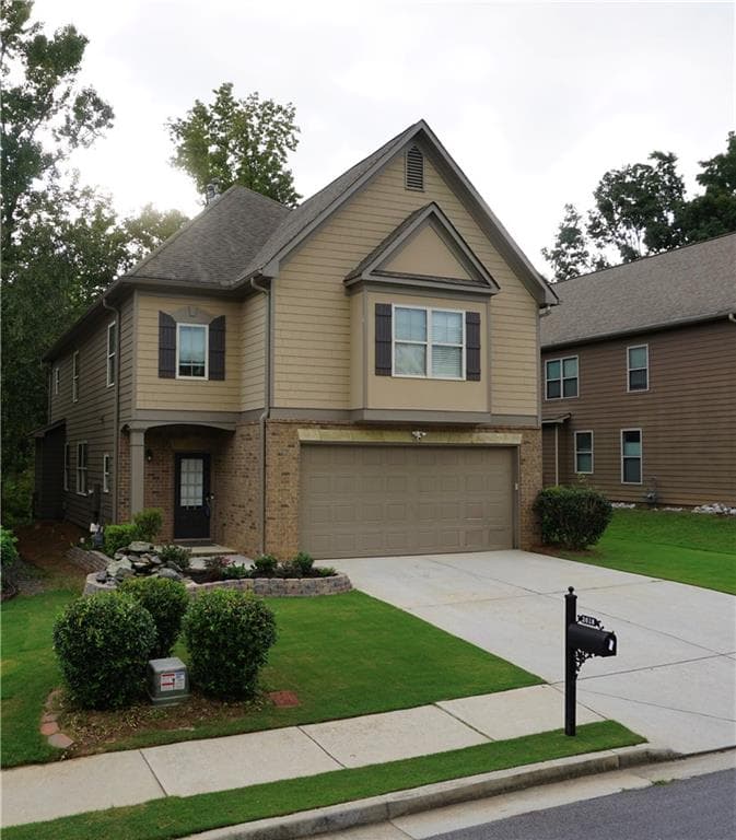 4 bedroom, 3 bathroom, 2,722 sq ft single family residence for sale at 2618 Lake Manor Circle, Duluth, GA 30096 — photo 3