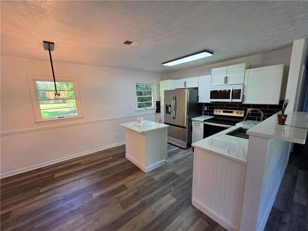 3 bedroom, 2 bathroom, 1,075 sq ft single family residence for sale at 3570 Briar Drive, Lithia Springs, GA 30122 — photo 3