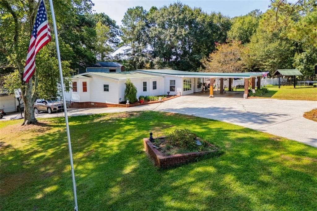 3 bedroom, 2 bathroom, 2,379 sq ft single family residence for sale at 2074 Roopville Veal Road, Roopville, GA 30170