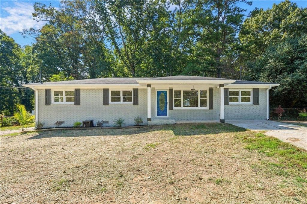 4 bedroom, 3 bathroom, 1,400 sq ft single family residence for sale at 6963 Debbie Lane, Lithia Springs, GA 30122 — photo 2