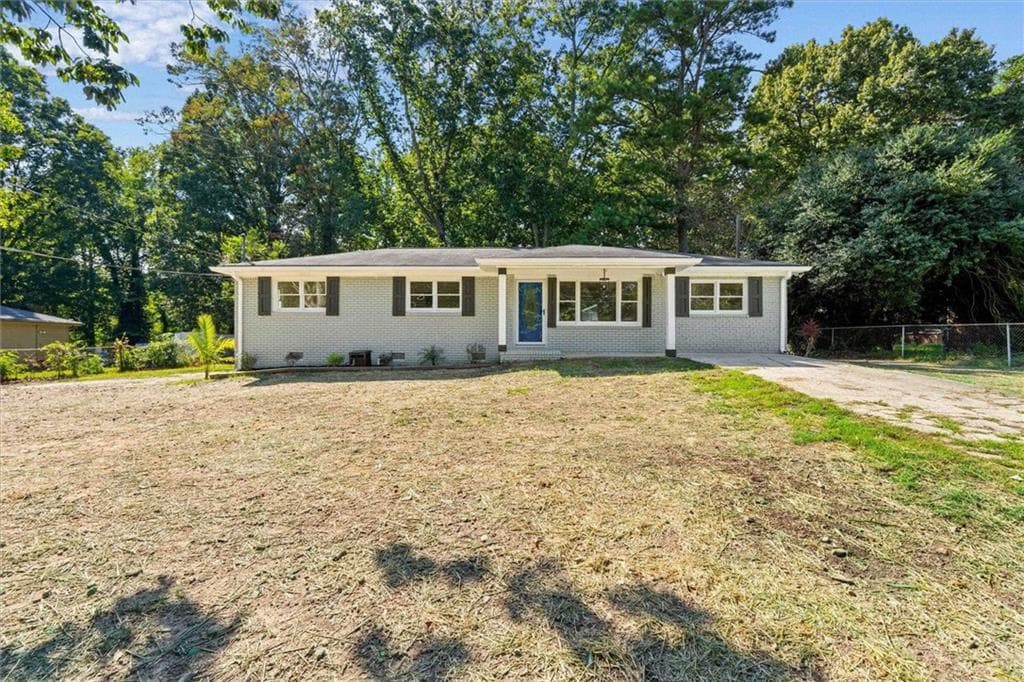 4 bedroom, 3 bathroom, 1,400 sq ft single family residence for sale at 6963 Debbie Lane, Lithia Springs, GA 30122 — photo 3
