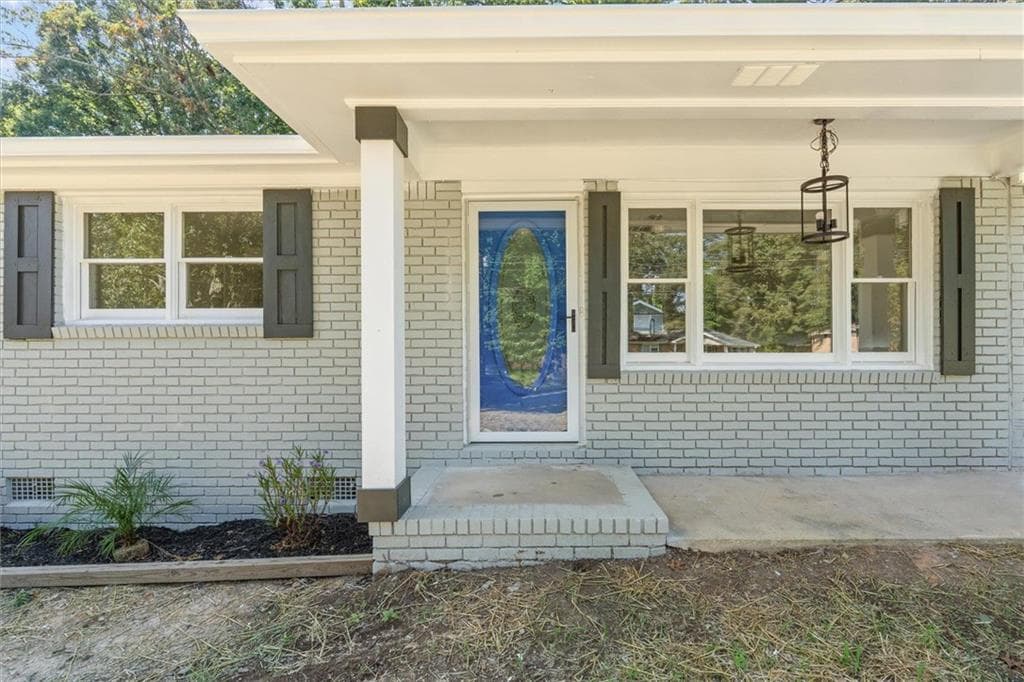 4 bedroom, 3 bathroom, 1,400 sq ft single family residence for sale at 6963 Debbie Lane, Lithia Springs, GA 30122 — photo 5