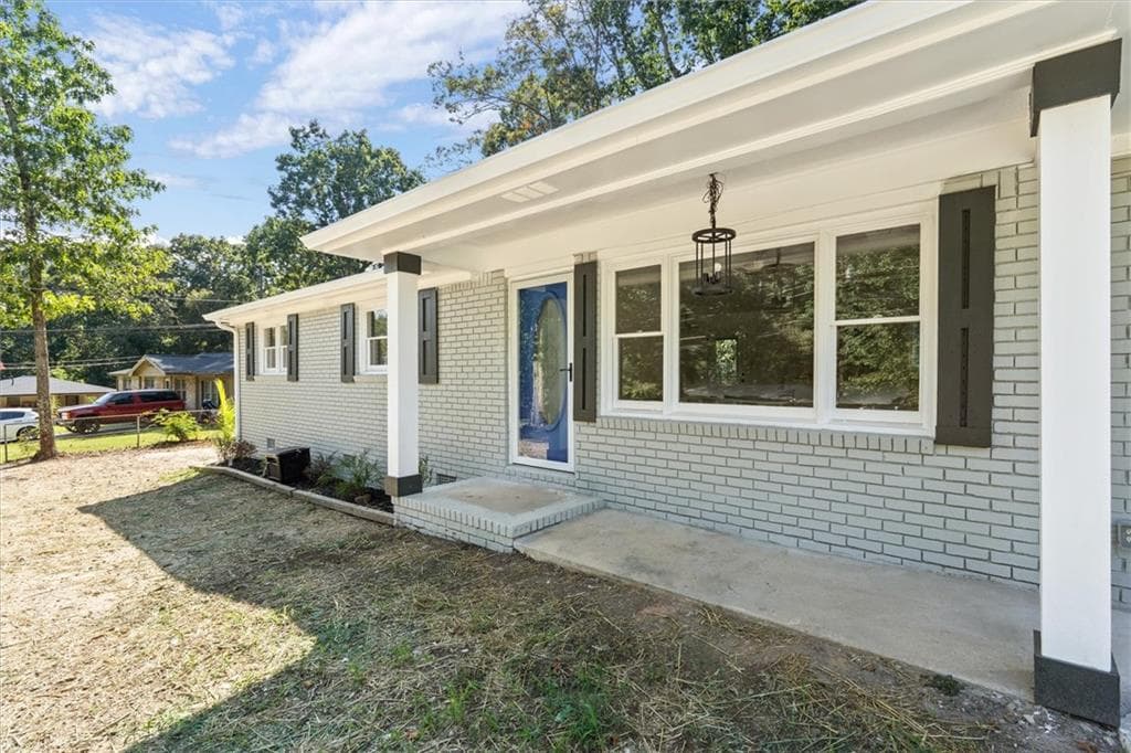 4 bedroom, 3 bathroom, 1,400 sq ft single family residence for sale at 6963 Debbie Lane, Lithia Springs, GA 30122 — photo 6