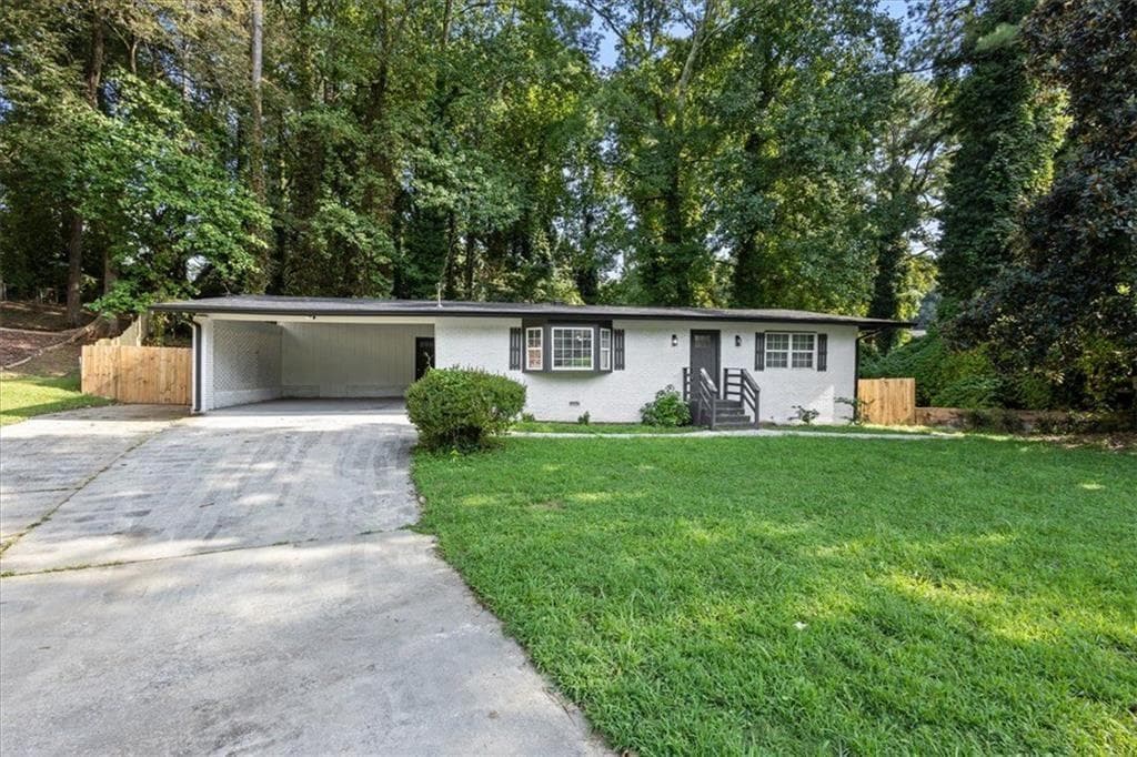 4 bedroom, 2 bathroom, 2,222 sq ft single family residence for sale at 4720 Shoshonee Trail, College Park, GA 30349