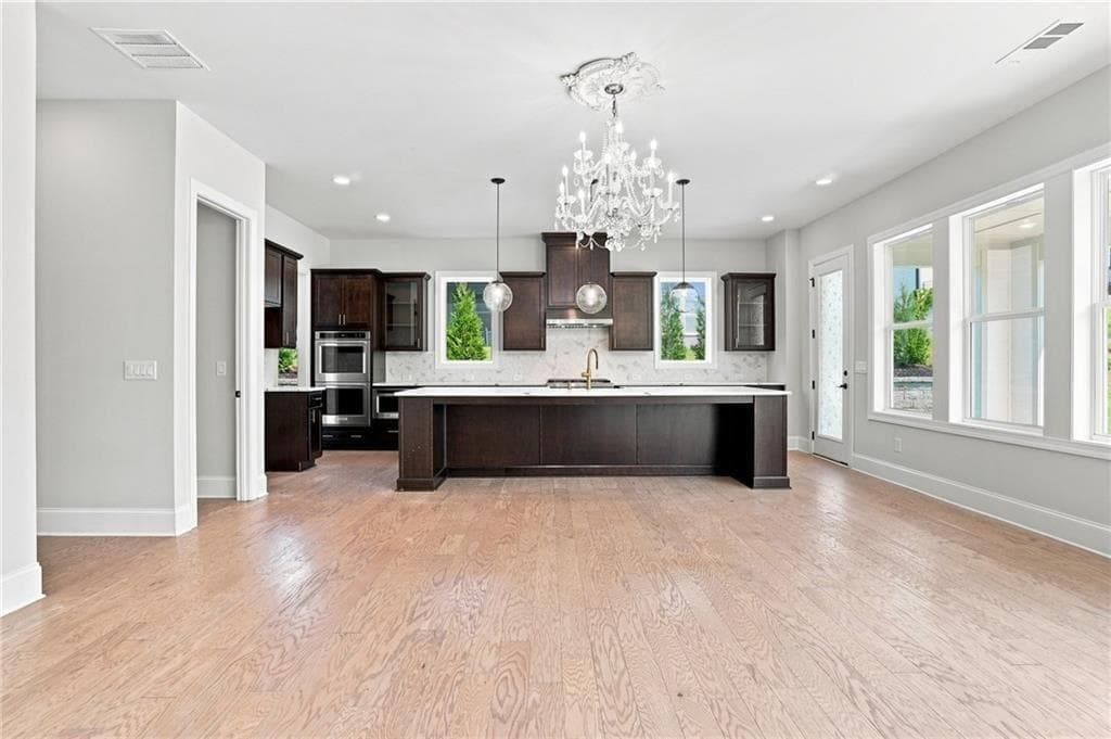 5 bedroom, 6 bathroom, 3,990 sq ft single family residence for sale at 886 Keystone Drive, Woodstock, GA 30188 — photo 9