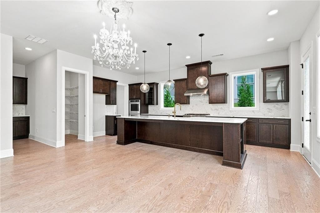 5 bedroom, 6 bathroom, 3,990 sq ft single family residence for sale at 886 Keystone Drive, Woodstock, GA 30188 — photo 10