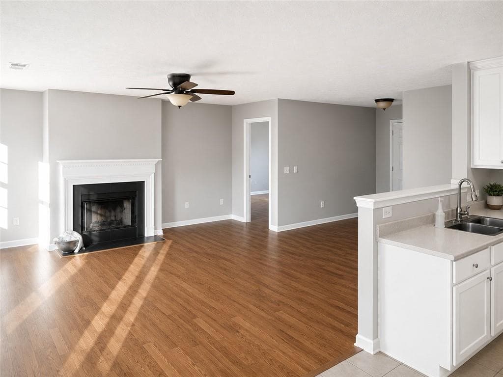 4 bedroom, 2 bathroom, 1,606 sq ft single family residence for sale at 7420 Tatum Court, Cumming, GA 30028 — photo 2