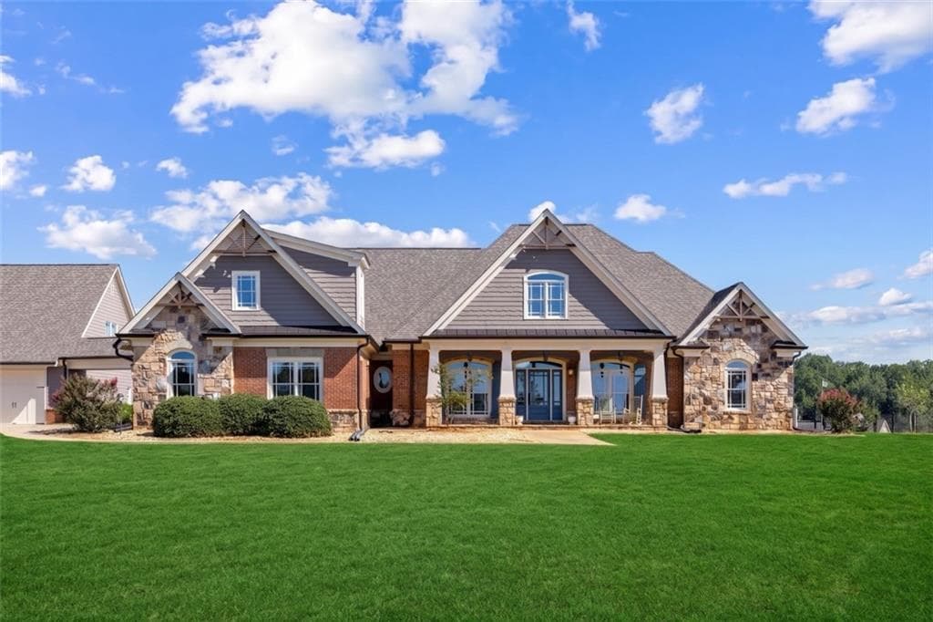 4 bedroom, 5 bathroom, 4,916 sq ft single family residence for sale at 1051 Gresham Road, Good Hope, GA 30641 — photo 2
