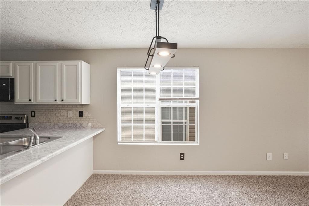 3 bedroom, 2 bathroom, 1,299 sq ft single family residence for sale at 923 Carlton Pointe Terrace, Palmetto, GA 30268 — photo 9