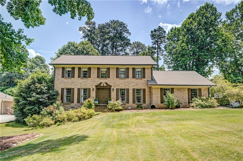 4 bedroom, 3 bathroom, 3,406 sq ft single family residence for sale at 4414 Dunriver Drive, Lilburn, GA 30047