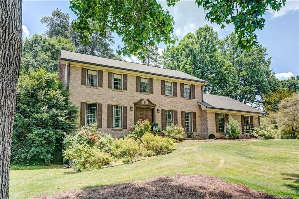 4 bedroom, 3 bathroom, 3,406 sq ft single family residence for sale at 4414 Dunriver Drive, Lilburn, GA 30047 — photo 3