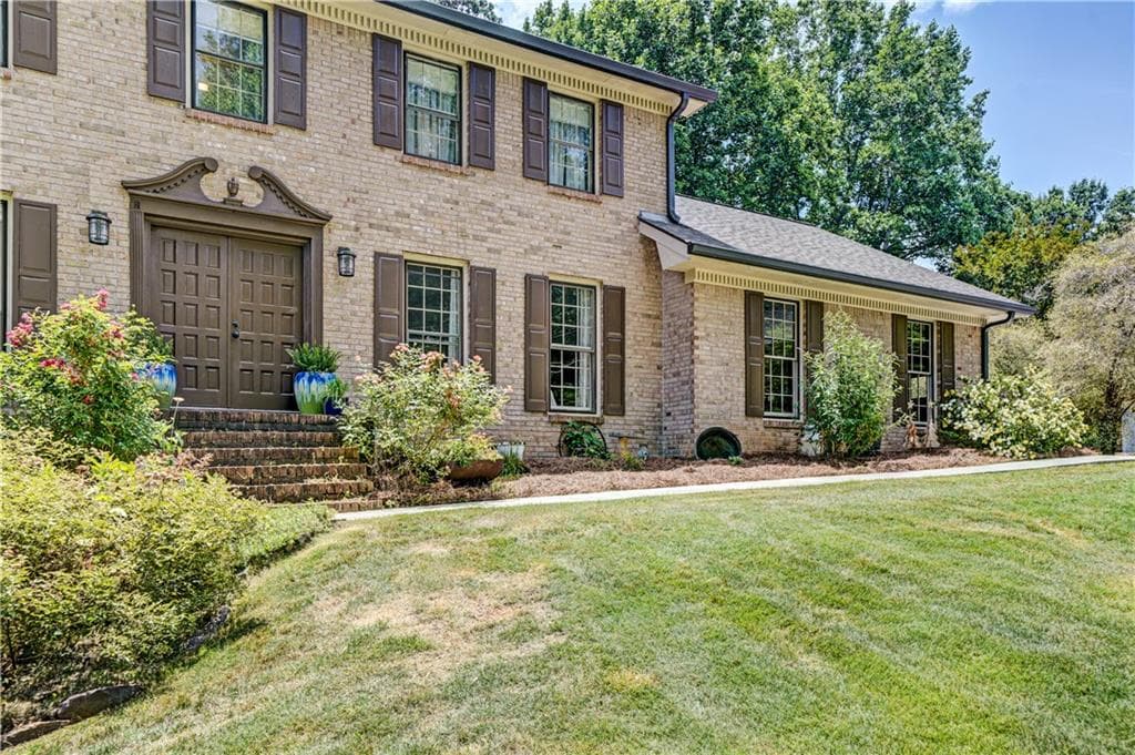 4 bedroom, 3 bathroom, 3,406 sq ft single family residence for sale at 4414 Dunriver Drive, Lilburn, GA 30047 — photo 4
