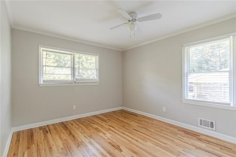 5 bedroom, 4 bathroom, 1,610 sq ft single family residence for sale at 927 Magna Carta Drive, Atlanta, GA 30318 — photo 9