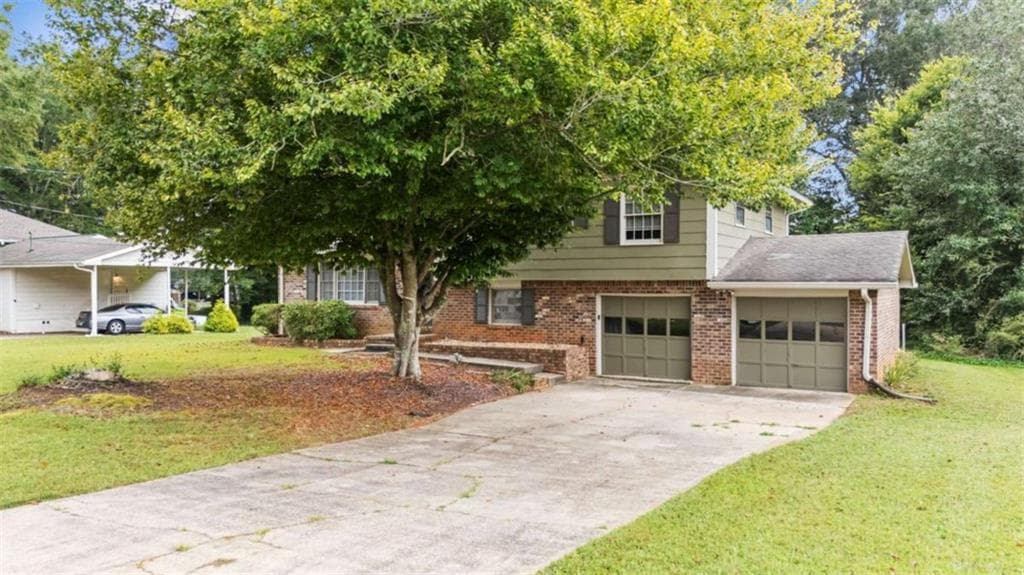 4 bedroom, 2 bathroom, 1,562 sq ft single family residence for sale at 4561 Fairfax Place, Powder Springs, GA 30127 — photo 2
