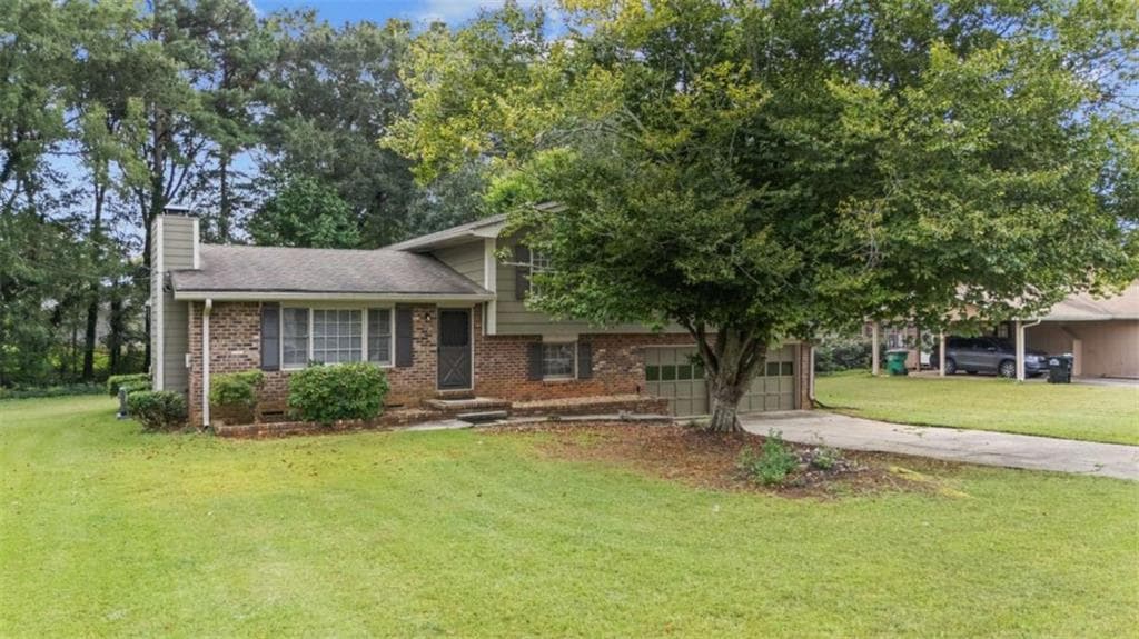 4 bedroom, 2 bathroom, 1,562 sq ft single family residence for sale at 4561 Fairfax Place, Powder Springs, GA 30127 — photo 3
