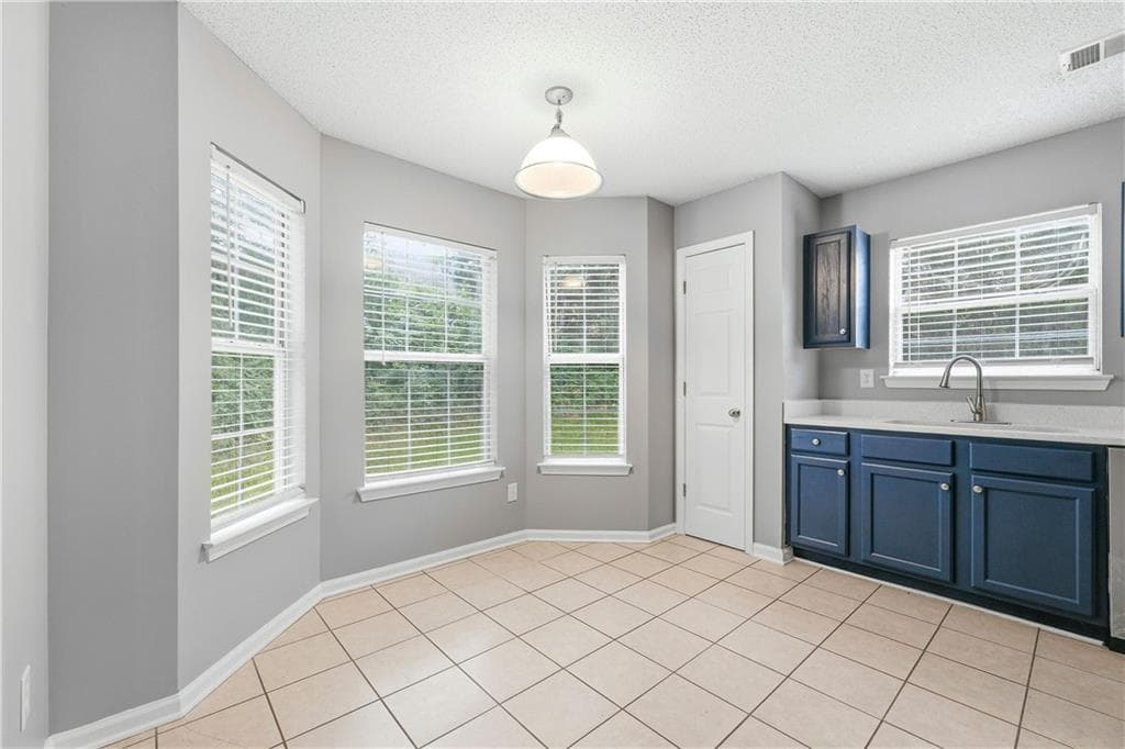 4 bedroom, 3 bathroom, 2,024 sq ft single family residence for sale at 2376 Creel Road, Atlanta, GA 30349 — photo 9