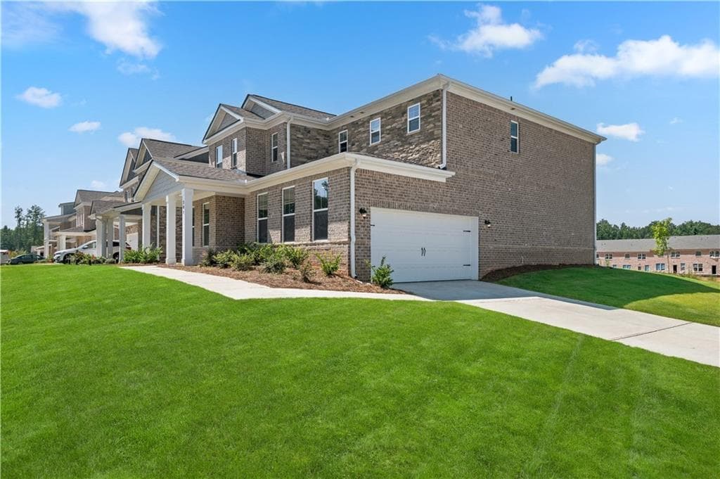 4 bedroom, 3 bathroom, 2,692 sq ft single family residence for sale at 397 Enchanted Springs Court, Mcdonough, GA 30253 — photo 4