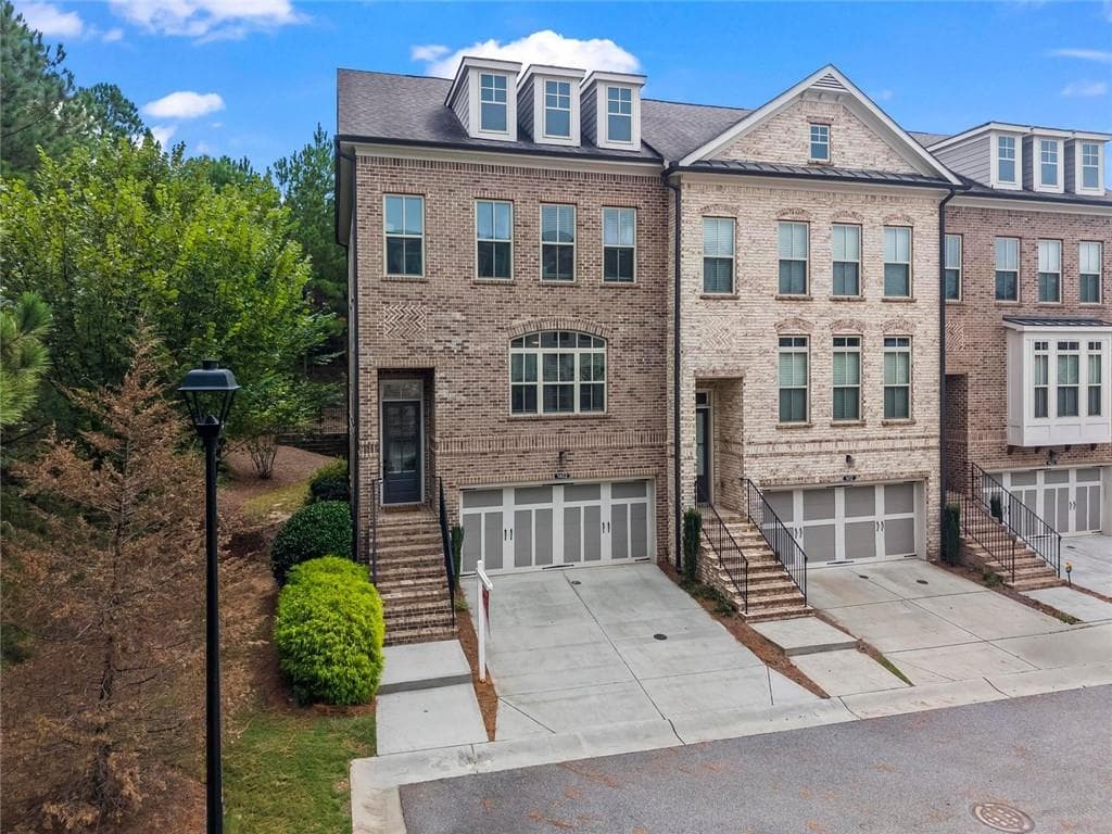 4 bedroom, 4 bathroom, 2,302 sq ft townhouse for sale at 1402 Wisteria Wall Drive, Suwanee, GA 30024