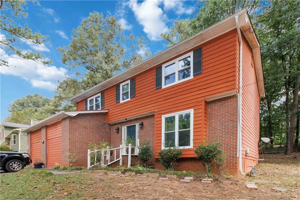 4 bedroom, 3 bathroom, 2,024 sq ft single family residence for sale at 1131 Reilly Lane, Clarkston, GA 30021 — photo 2