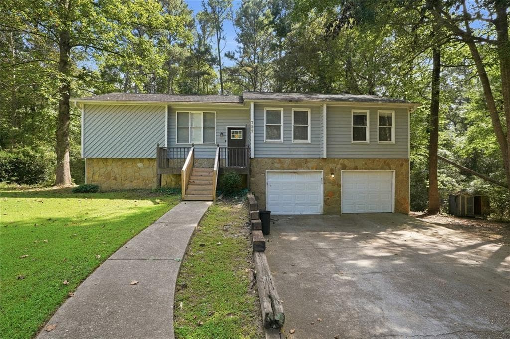 4 bedroom, 3 bathroom, 1,327 sq ft single family residence for sale at 732 Harness Court, Lithonia, GA 30058 — photo 1 of 34